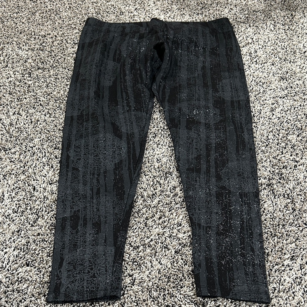 Women’s Black capris leggings, thermal top and a tank top.